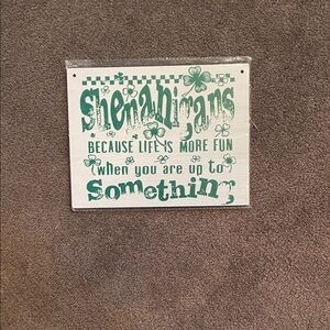 Green and White Decorative Sign